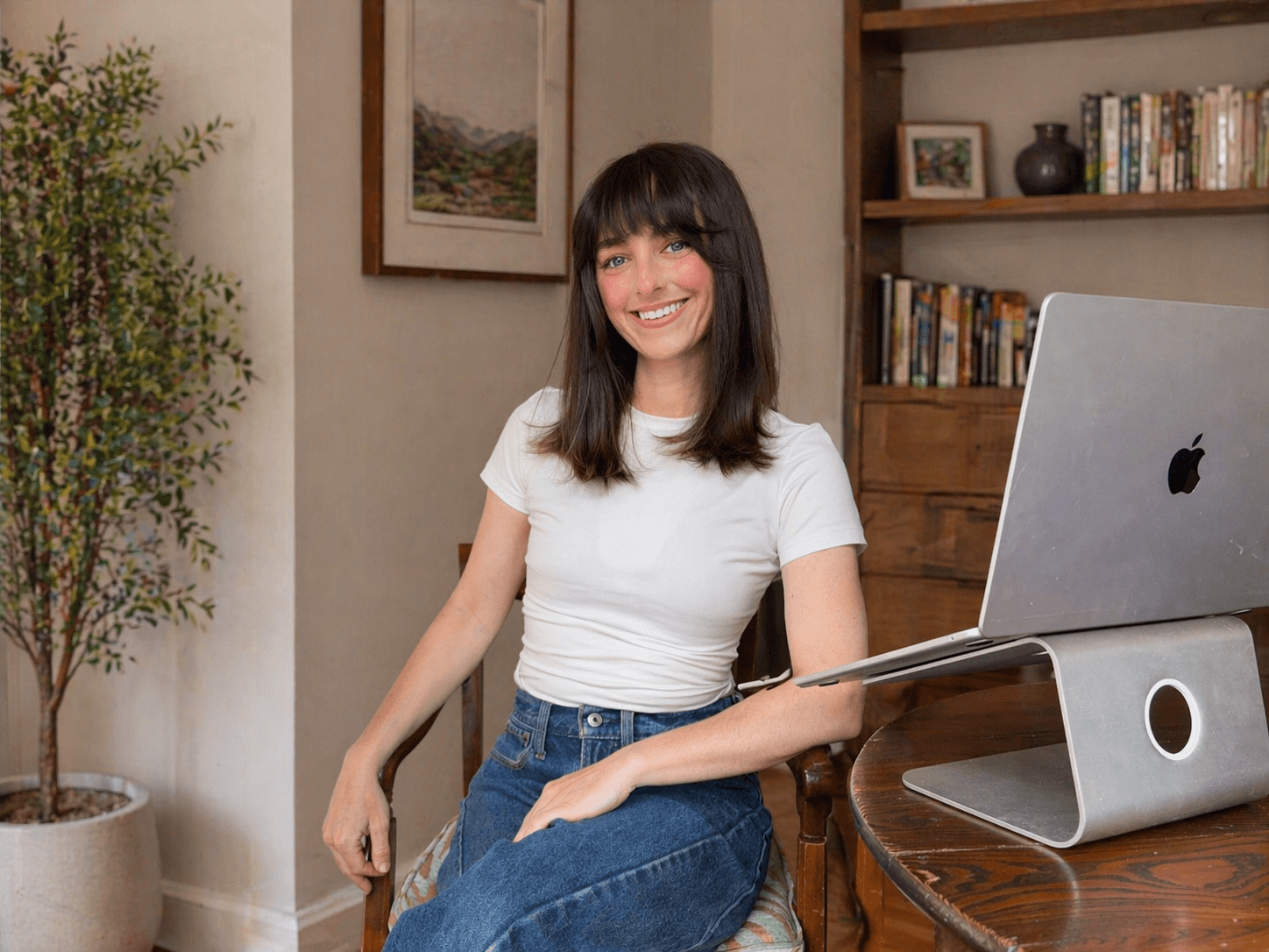 Hannah working at her kitchen computer